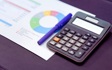 Calculator And Pen And Chart